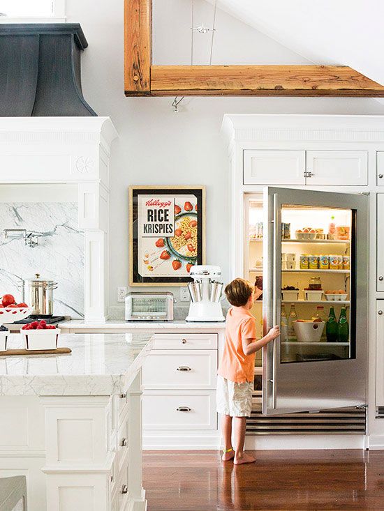 a glass door fridge is a great idea to make your kitchen feel more modern than it is, or just a perfect fit for a modern one