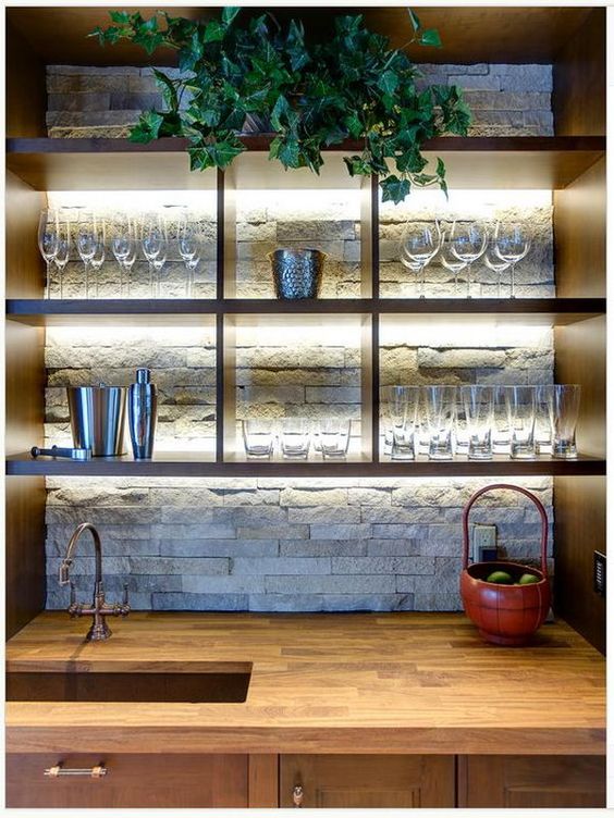 lit up basement bar in light colors