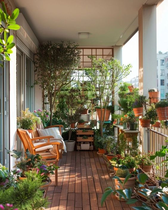 a lovely balcony with modern stained furniture, a crate stand, some plants with greenery and cacti and a trellis as a space divider