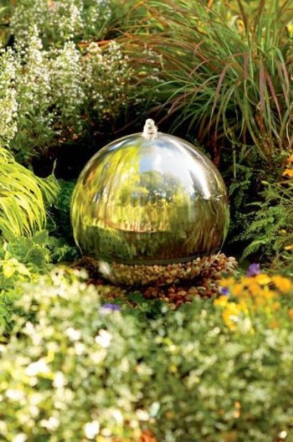 a mirror ball fountain is a gorgeous decoration and a miniature water feature for a modern garden, it won't take much space