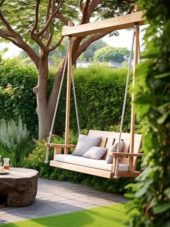 a stained frame with a hanging chair and pillows is a nice fit for a modern or contemporary space, you can use it in the terrace, deck or patio