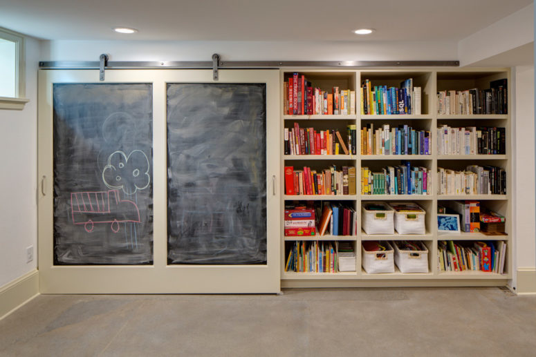 Sliding barn doors could hide all your stored stuff to make the basement looks neat and uncluttered (Hammer &amp; Hand)