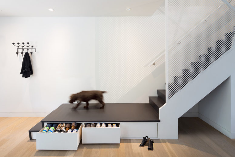 Not only space under stairs could be used for storage but stairs themselves could become functional drawers. (post Architecture)