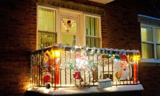 masks and Santa Claus and colorful lights make the balcony festive and bright