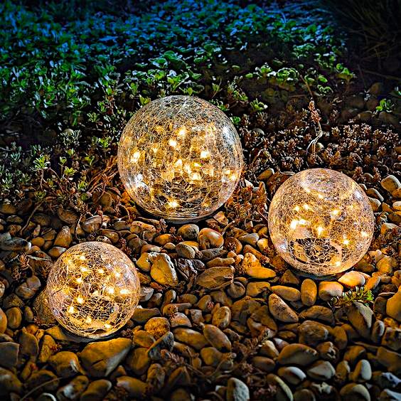 garden balls with lights inside will be a beautiful decoration and light feature for your garden