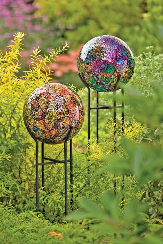 lovely colorful mosaic garden balls on tall stand that make them visible from all the sides and a distance