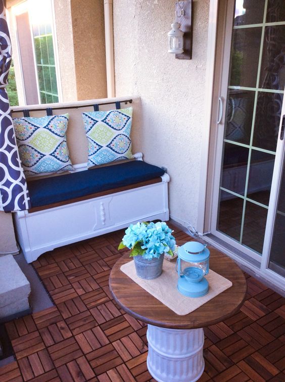 make a simple storage bench and go for a pillow back hanging the pillows on a stick or holder