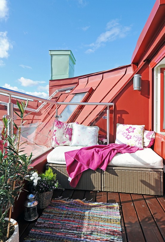 a bench built of two pieces for storage is a cool idea for any small balcony