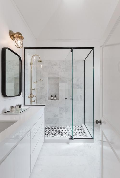 white marbelized basement bathroom