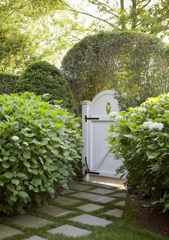 you won't need to cover the fence and gate with greenery if you have a lot of lush greenery along them and outside