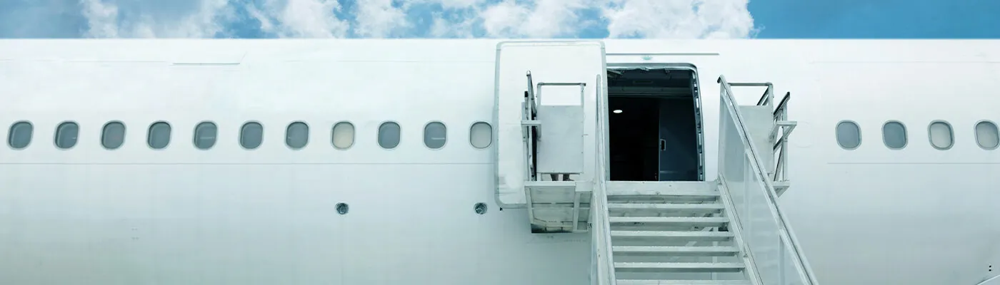 Airplane with stairs exit extended