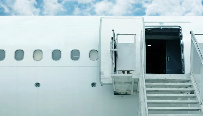 Airplane with stairs exit extended