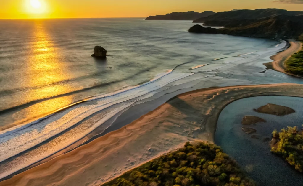 Beautiful aerial view of a sunset in Naranjo Beach - Witch Rock Costa Rica