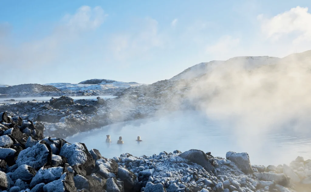 Three people waiting in the  Blue Lagoon thermal baths