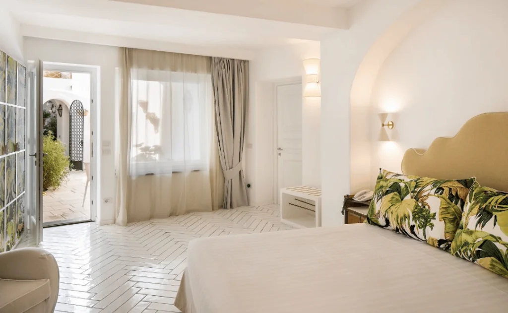 Botania Relais & Spa Hotel Review - superior room with terrace garden view bedroom lighting 