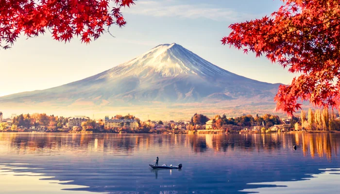 Colorful Autumn Season and Mountain Fuji with morning fog and red leaves at lake Kawaguchiko