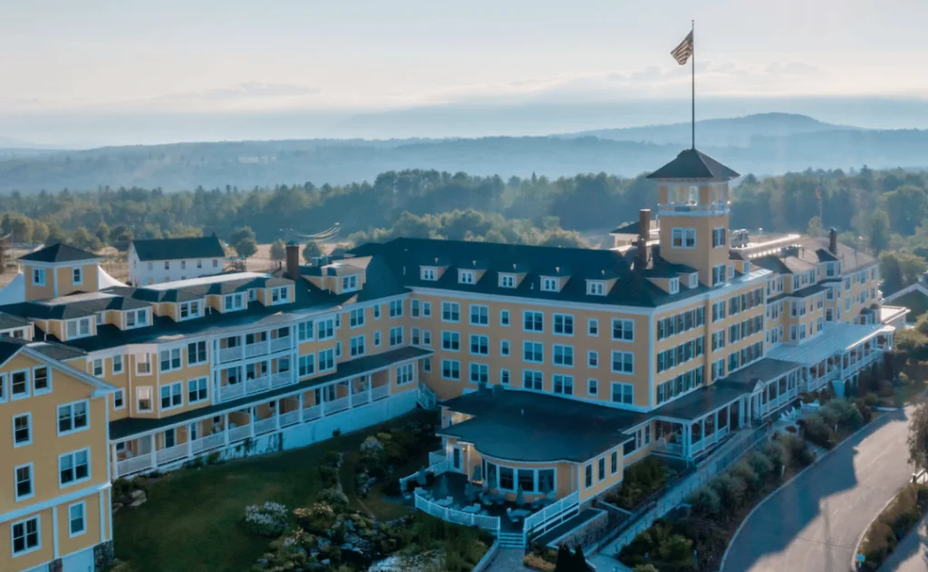 Exterior of the Mountain Grand Resort with scenic mountainous background 