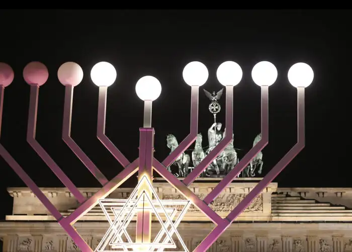 Menorah during Hanukkah in front of Brandenburg Gate