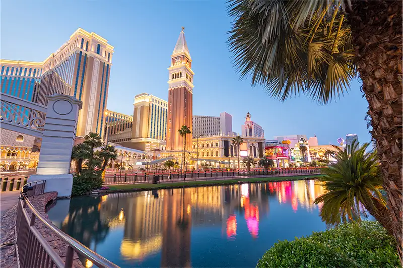 Busy street in Las Vegas, Nevada, as seen from across a lake