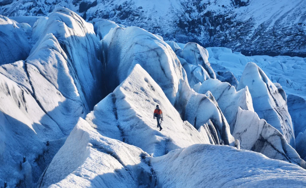 Man walking on Vatnajökull, Vatna Glacier in iceland.