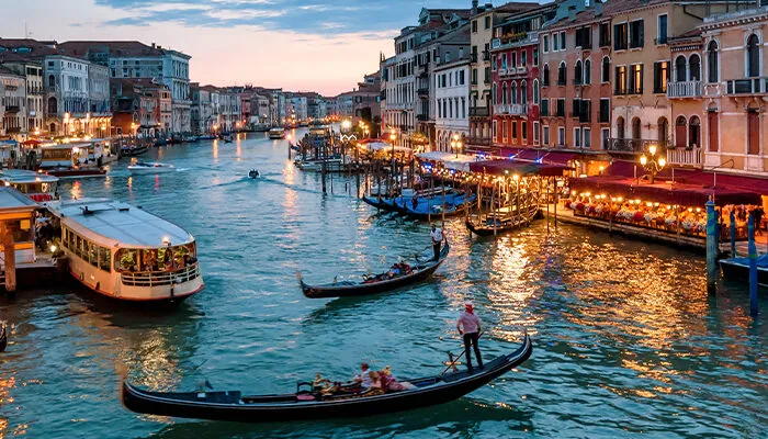 Panorama of Venice at night, Italy. Urban landscape with city lights.