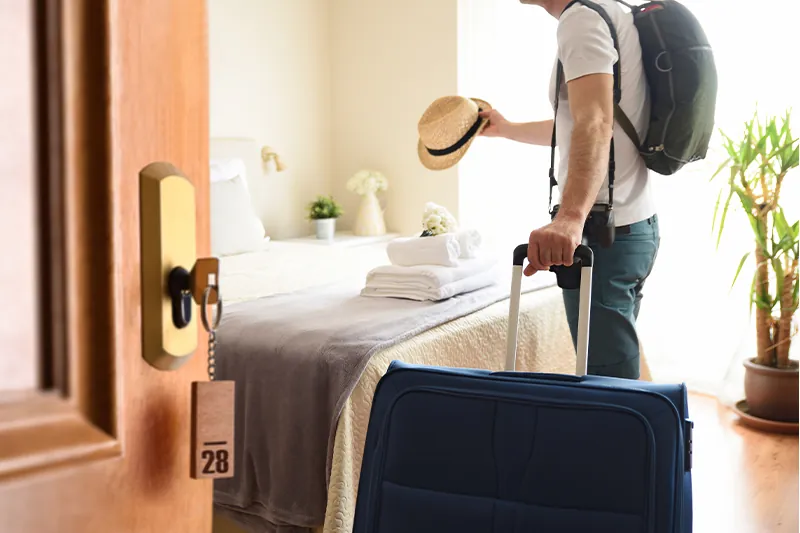 Person entering hotel room