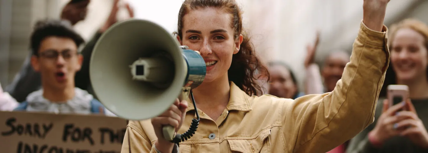 woman with megaphone during a strike