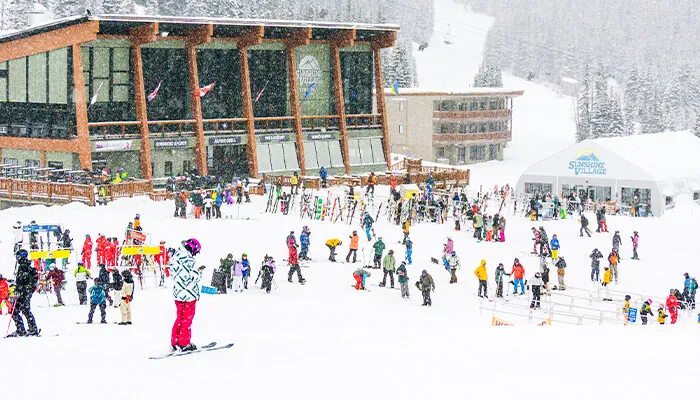 Many people skiing outside at Banff Sunshine Village