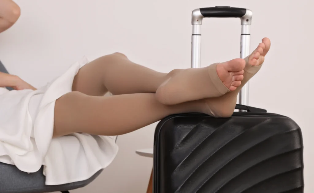 Woman wearing Compression Stockings in preparation for flight